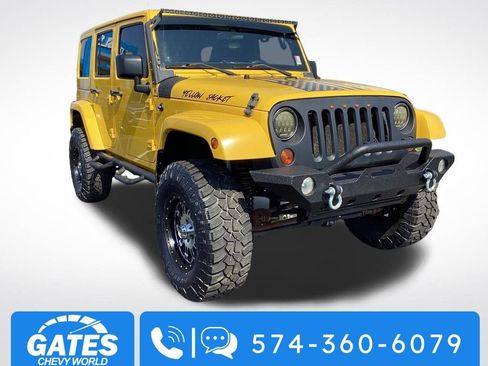 Used 2011 Jeep Wrangler Unlimited Sahara w/ Dual Top Group image 1