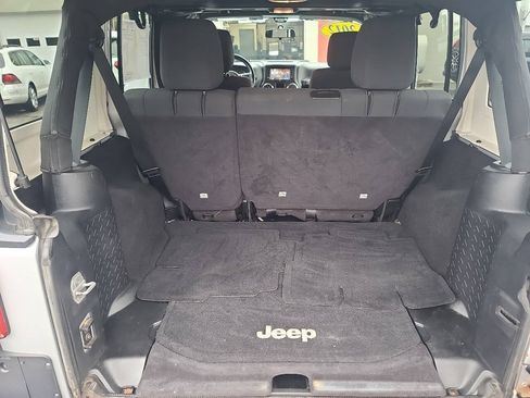 Used 2012 Jeep Wrangler Unlimited Sport w/ Dual Top Group AWD/4WD image 13