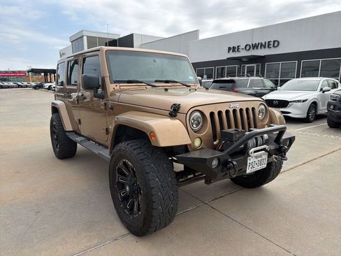 Used 2015 Jeep Wrangler Unlimited Sahara w/ Dual Top Group image 1