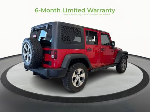 Used 2012 Jeep Wrangler Unlimited Rubicon w/ Dual Top Group AWD/4WD image 7