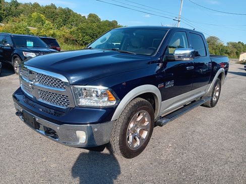 Used 2015 RAM 1500 Laramie w/ Convenience Group AWD/4WD image 1