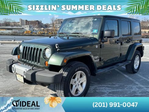 Used 2011 Jeep Wrangler Unlimited Sahara w/ Dual Top Group AWD/4WD image 3