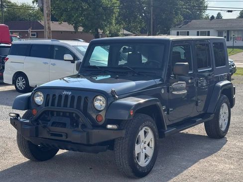 Used 2007 Jeep Wrangler Unlimited Sahara w/ Dual Top Group AWD/4WD image 25