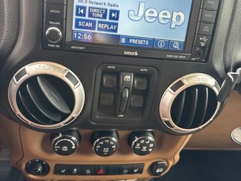 Used 2012 Jeep Wrangler Unlimited Sahara w/ Dual Top Group AWD/4WD image 11
