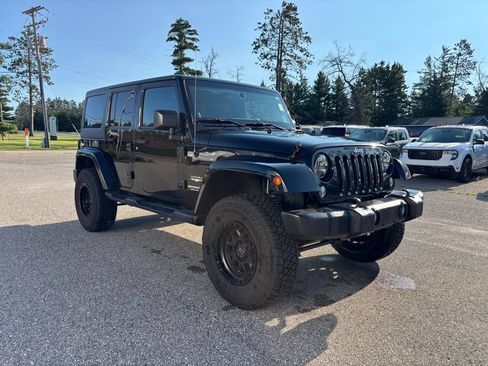 Used 2014 Jeep Wrangler Unlimited Sahara w/ Connectivity Group AWD/4WD image 1