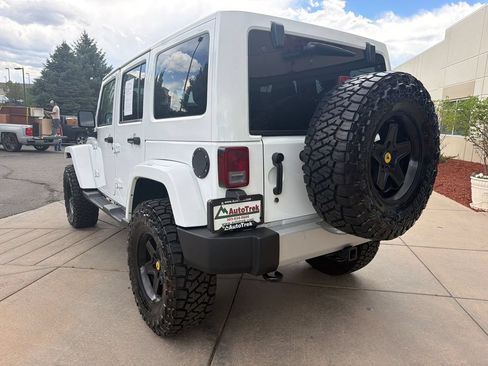 Used 2013 Jeep Wrangler Unlimited Sahara w/ Dual Top Group AWD/4WD image 7
