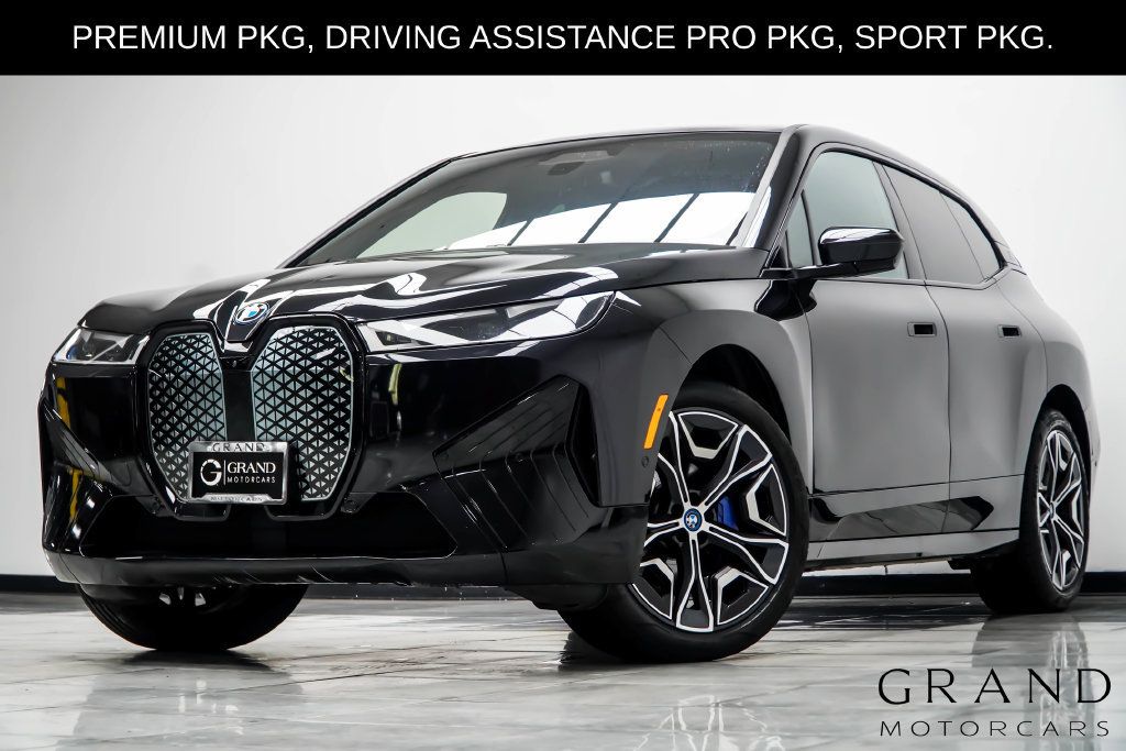 Used 2024 BMW iX xDrive50 w/ Premium Package AWD/4WD image 1