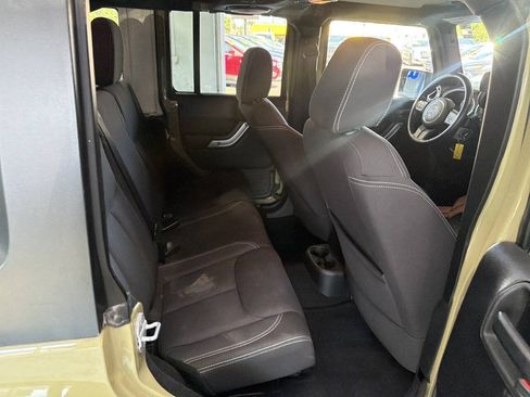 Used 2013 Jeep Wrangler Unlimited Sahara w/ Dual Top Group AWD/4WD image 17