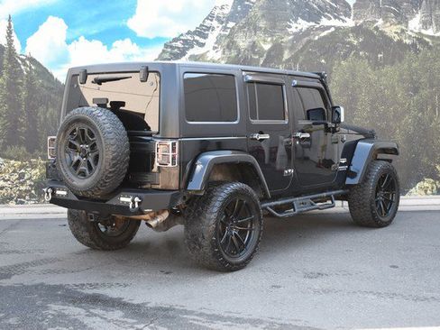Used 2012 Jeep Wrangler Unlimited Sahara w/ Dual Top Group AWD/4WD image 3