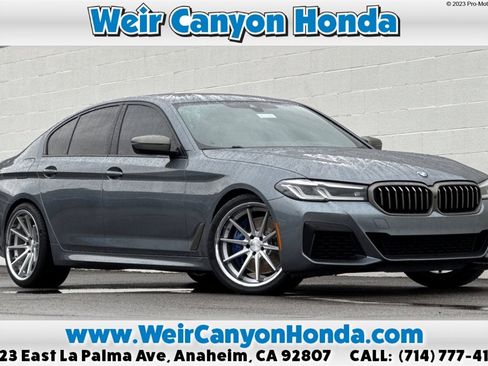 Used 2022 BMW M550i xDrive w/ Executive Package image 1