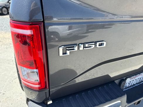 Used 2015 Ford F150 XLT AWD/4WD image 14
