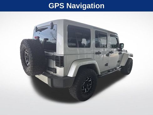 Used 2012 Jeep Wrangler Unlimited Sahara w/ Dual Top Group AWD/4WD image 2