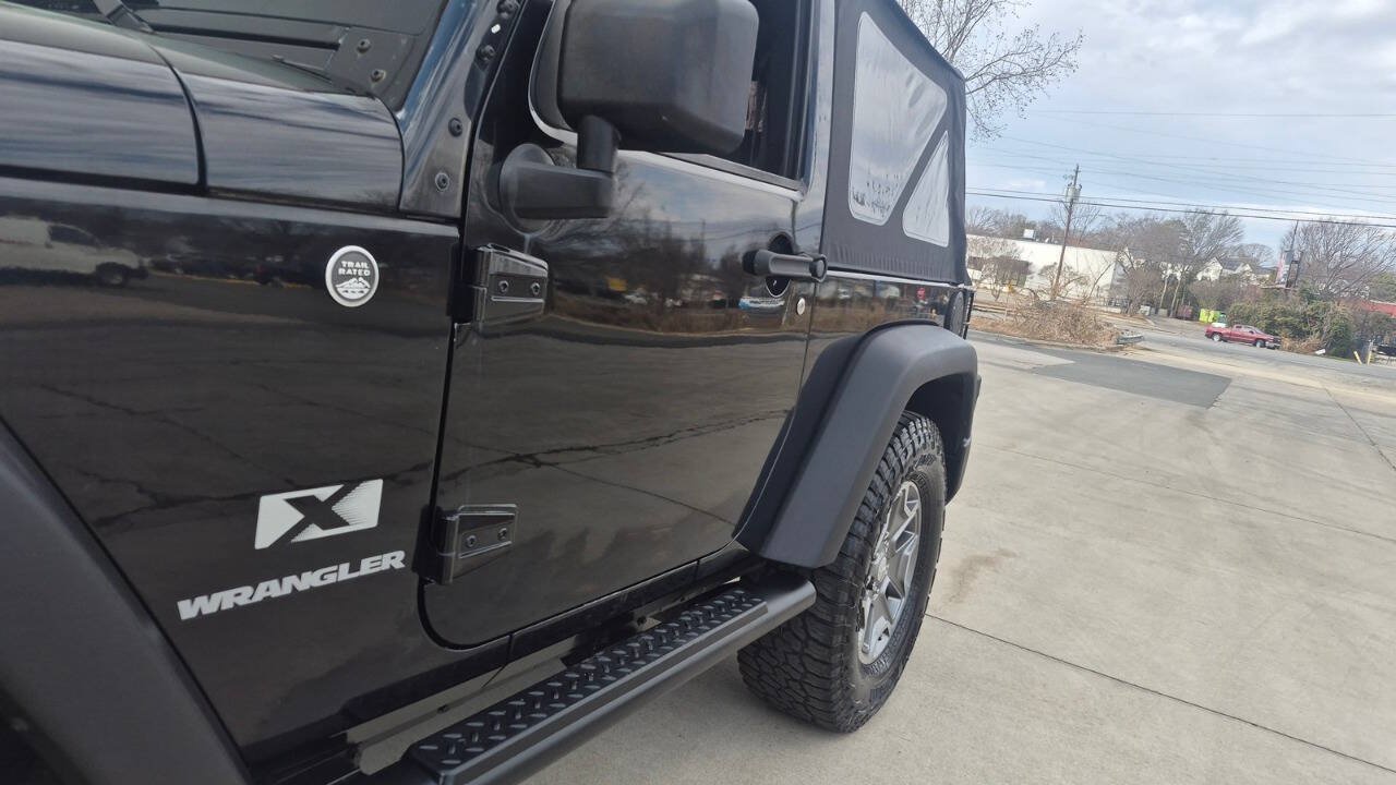 Used 2009 Jeep Wrangler X w/ Black Appearance Group AWD/4WD image 17