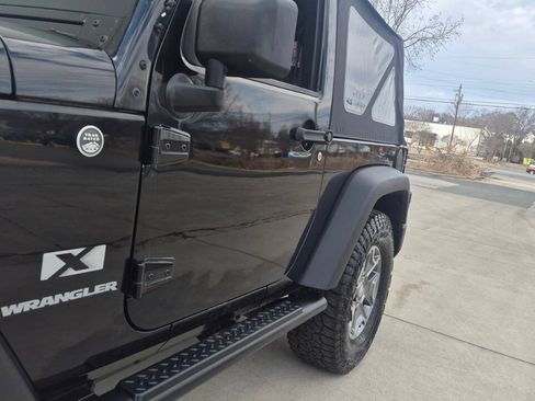 Used 2009 Jeep Wrangler X w/ Black Appearance Group AWD/4WD image 17