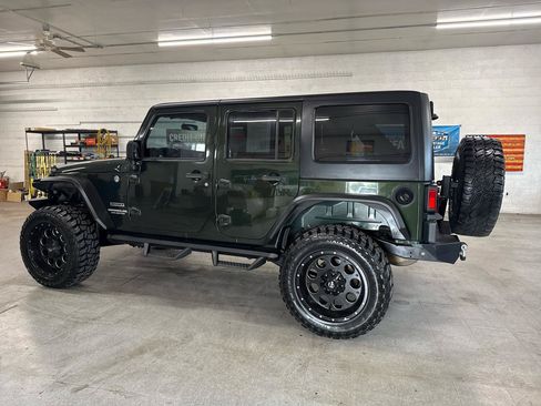 Used 2012 Jeep Wrangler Unlimited Sport AWD/4WD image 2
