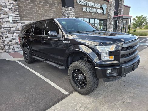 Used 2015 Ford F150 Lariat AWD/4WD image 1