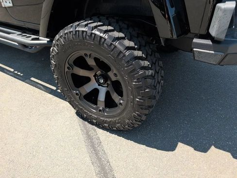 Used 2012 Jeep Wrangler Unlimited Sahara w/ Dual Top Group AWD/4WD image 21