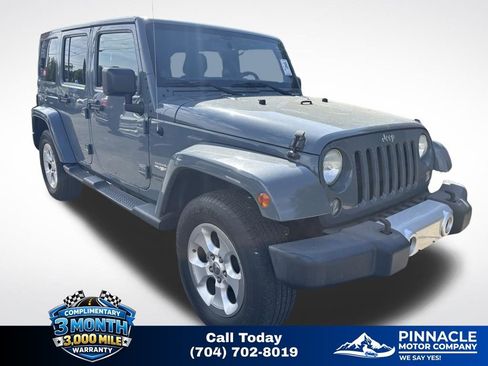 Used 2014 Jeep Wrangler Unlimited Sahara w/ Connectivity Group AWD/4WD image 1