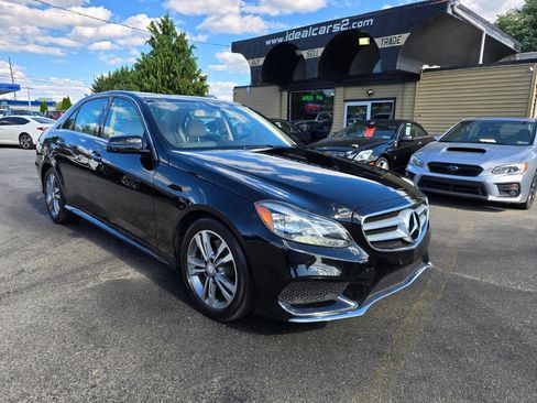 Used 2015 Mercedes-Benz E 250 BlueTEC 4MATIC Sedan w/ Premium 1 Package image 1