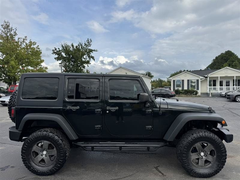 Used 2012 Jeep Wrangler Unlimited Sport AWD/4WD image 8