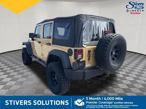 Used 2013 Jeep Wrangler Unlimited Sport w/ Mopar Black Appearance Group AWD/4WD image 10
