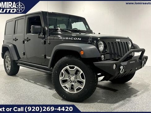 Used 2016 Jeep Wrangler Unlimited Rubicon w/ Dual Top Group AWD/4WD image 1