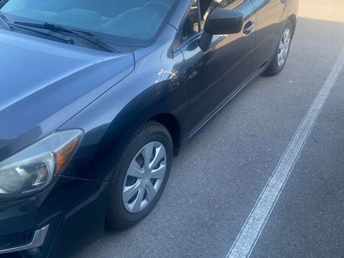 Used 2015 Subaru Impreza 2.0i AWD/4WD image 1