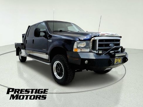 Used 1999 Ford F250 4x4 Crew Cab Super Duty image 1