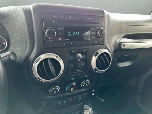 Used 2015 Jeep Wrangler Unlimited Rubicon w/ Dual Top Group AWD/4WD image 14