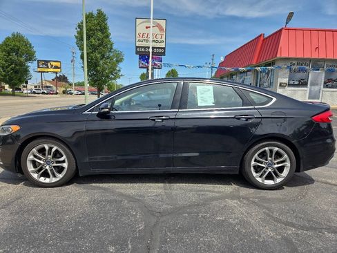 Used 2020 Ford Fusion Titanium FWD image 1