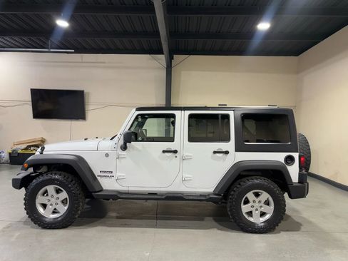 Used 2013 Jeep Wrangler Unlimited Sport AWD/4WD image 8