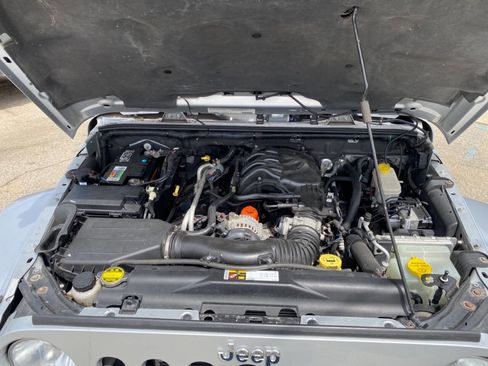 Used 2012 Jeep Wrangler Unlimited Sahara w/ Dual Top Group AWD/4WD image 14