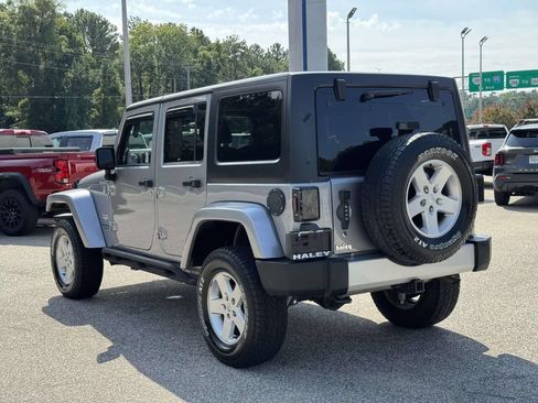 Used 2013 Jeep Wrangler Unlimited Sahara w/ Dual Top Group AWD/4WD image 22
