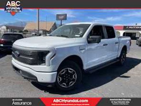 Used 2023 Ford F150 Lightning XLT image 1