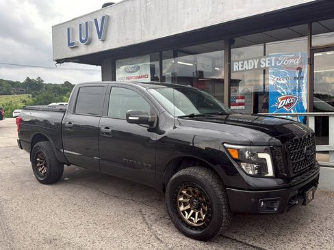 Used 2019 Nissan Titan SL w/ Midnight Edition AWD/4WD image 1