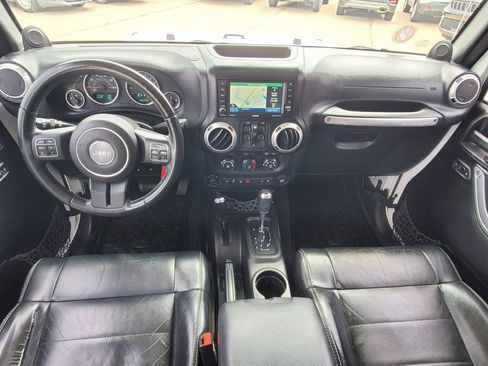 Used 2012 Jeep Wrangler Unlimited Sahara w/ Dual Top Group AWD/4WD image 12