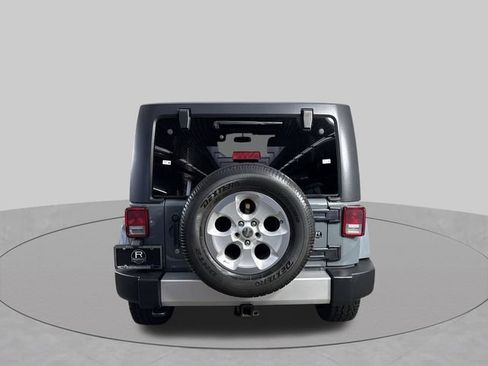 Used 2014 Jeep Wrangler Unlimited Sahara w/ Dual Top Group AWD/4WD image 30