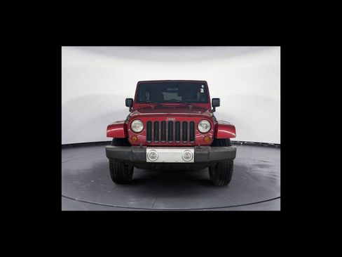 Used 2012 Jeep Wrangler Unlimited Sahara w/ Dual Top Group AWD/4WD image 9