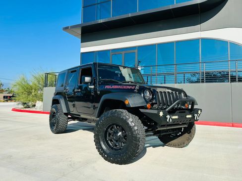 Used 2012 Jeep Wrangler Unlimited Sport AWD/4WD image 1