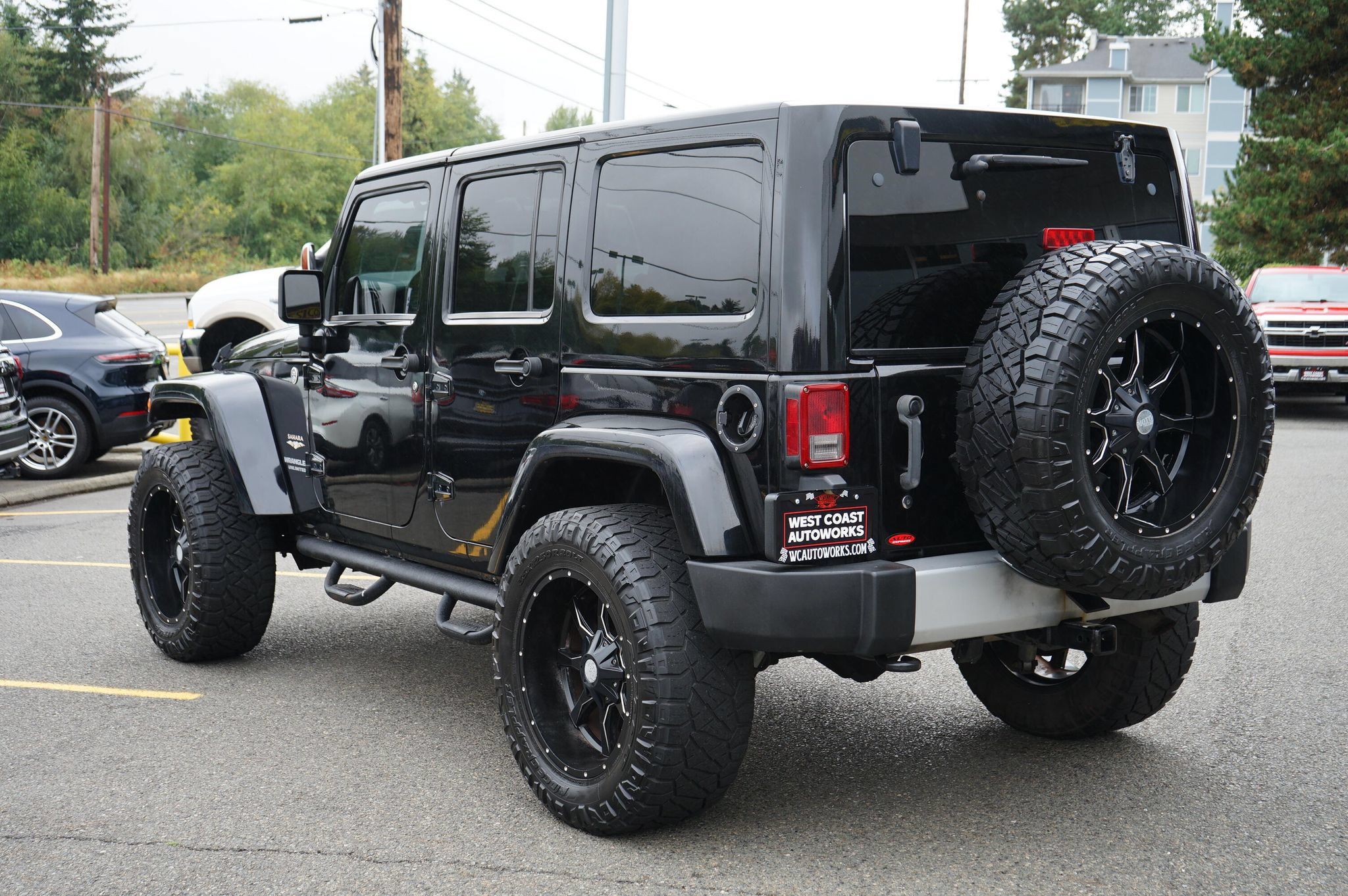 Used 2013 Jeep Wrangler Unlimited Sahara w/ Dual Top Group AWD/4WD image 3