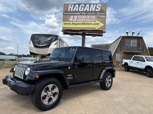 Used 2016 Jeep Wrangler Unlimited Sahara AWD/4WD image 1