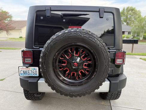 Used 2012 Jeep Wrangler Unlimited Sport w/ Black Appearance Group AWD/4WD image 5