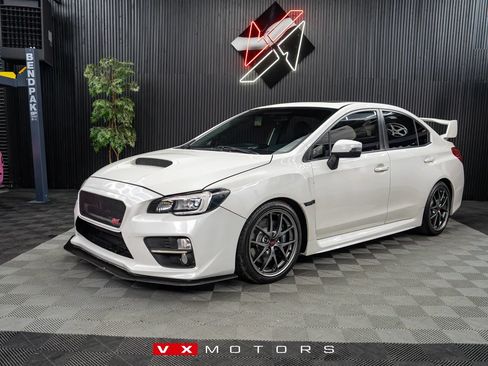 Used 2016 Subaru WRX STI Limited AWD/4WD image 1