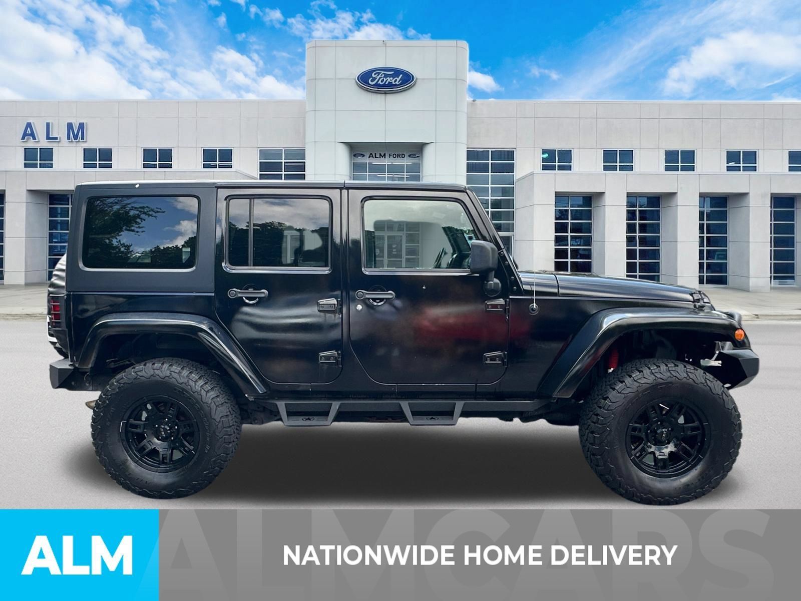 Used 2013 Jeep Wrangler Unlimited Sahara AWD/4WD image 4