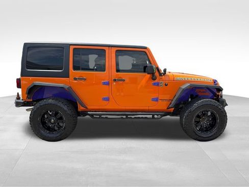Used 2013 Jeep Wrangler Unlimited Rubicon w/ Dual Top Group AWD/4WD image 8