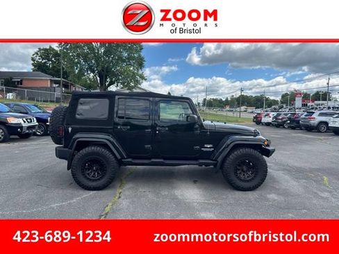 Used 2014 Jeep Wrangler Unlimited Sahara w/ Connectivity Group AWD/4WD image 1