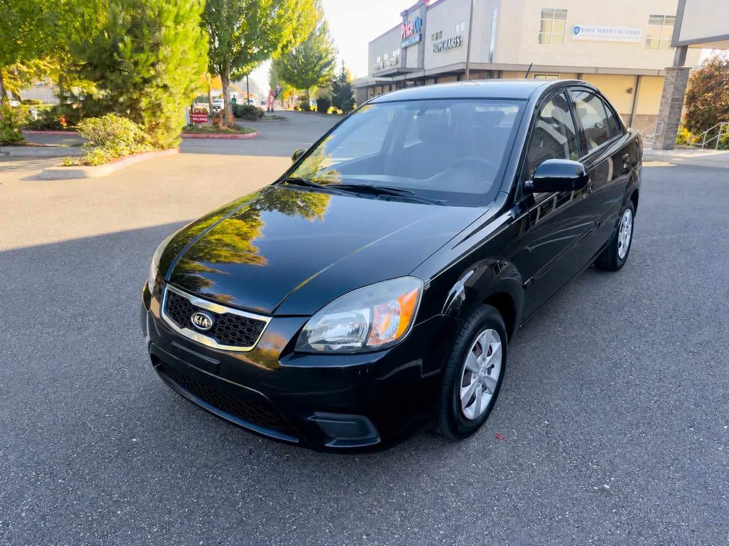 Used 2011 Kia Rio LX FWD image 1