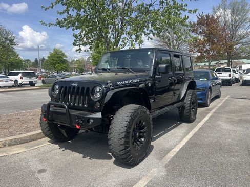 Used 2016 Jeep Wrangler Unlimited Rubicon w/ Dual Top Group image 1
