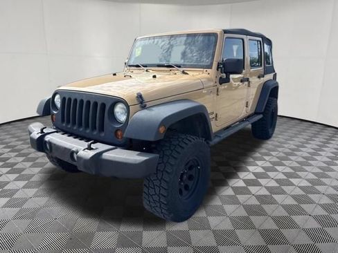 Used 2013 Jeep Wrangler Unlimited Sport w/ Mopar Black Appearance Group AWD/4WD image 13
