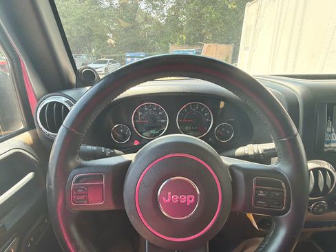Used 2013 Jeep Wrangler Unlimited Sahara AWD/4WD image 22